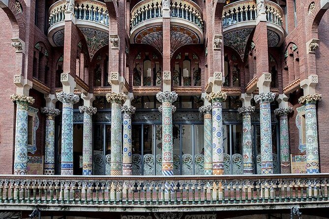 Palau de la Musica Catalana Guided Tour - Stairs, glass balusters, and tiled underside details up to the second floor
