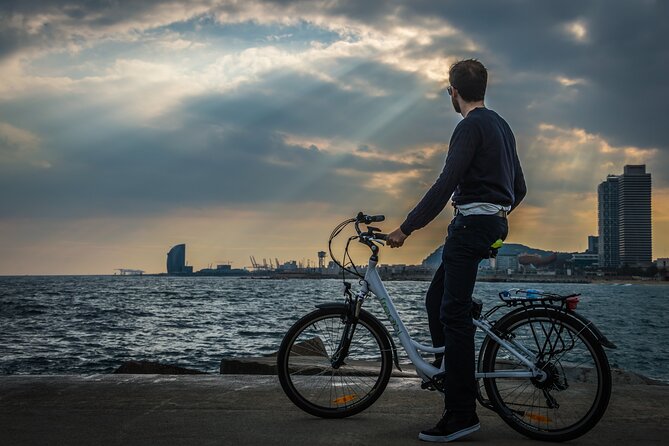 Private Barcelona E-Bike Photography Tour - The early stops: Columbus briefing, Olympic art, and beach angles