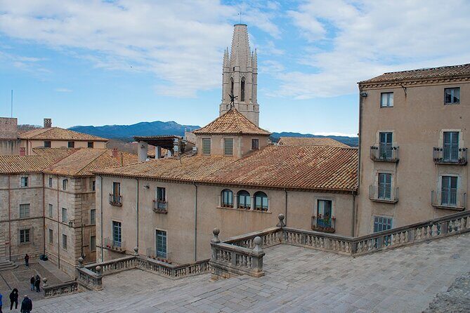 Private Full-Day Girona GOT and Costa Brava Tour - Pals medieval streets: fortress views, Sant Pere church, and a real lunch window