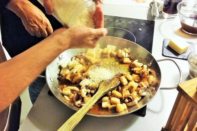 Private Paella class, Tapas, full menu and Sangria workshop - Plaça Reial Sets the Mood for a Barcelona Food Class