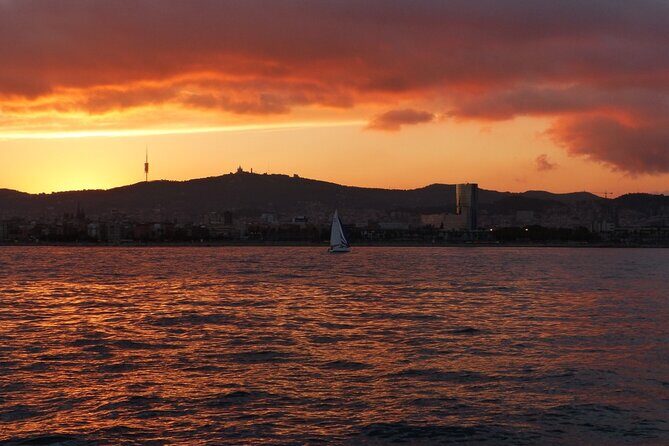 Private Sailing with SUP, Drinks and Appetizers from Barcelona - Barceloneta Beach From a Distance: Coastal Life Without the Crush