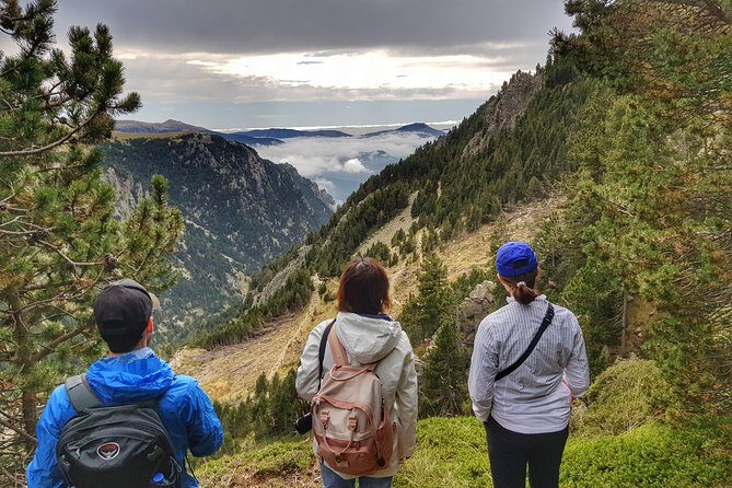 Pyrenees Mountain Train and Nature Walk - Vall de Núria: shrine, hotel exhibits, and lake time