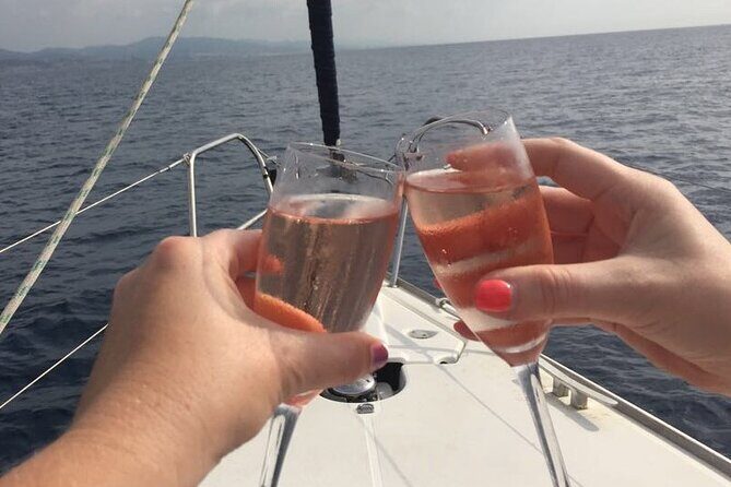 Sunset Sailboat Tour along the Coast with Open Bar - Guides and Atmosphere: From Claudio’s Charm to Quiet Commentary